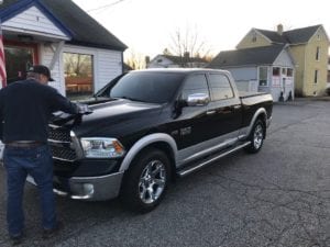 Black dodge ram with ceramic coating / paint protection film
