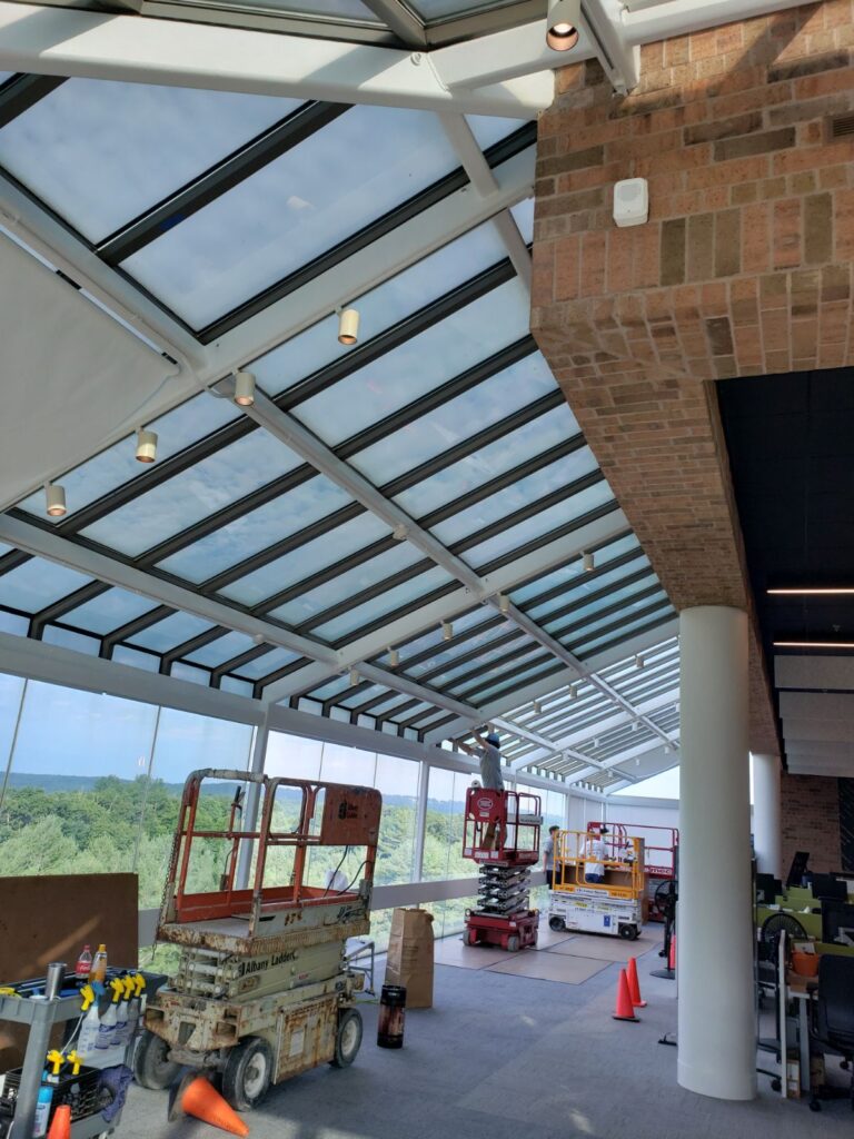 Glass skylight being installed